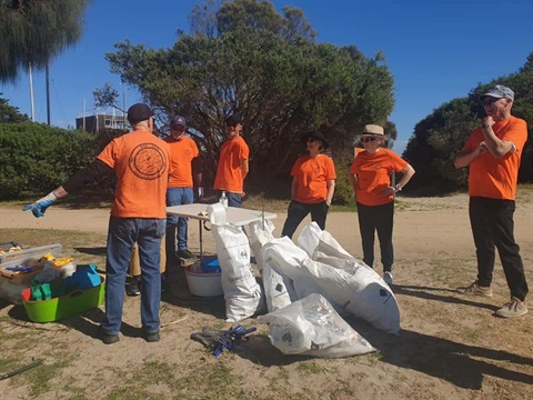 Rye Beach Patrol members sorting bottles and cans.jpg