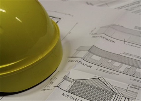 House plans and hard hat
